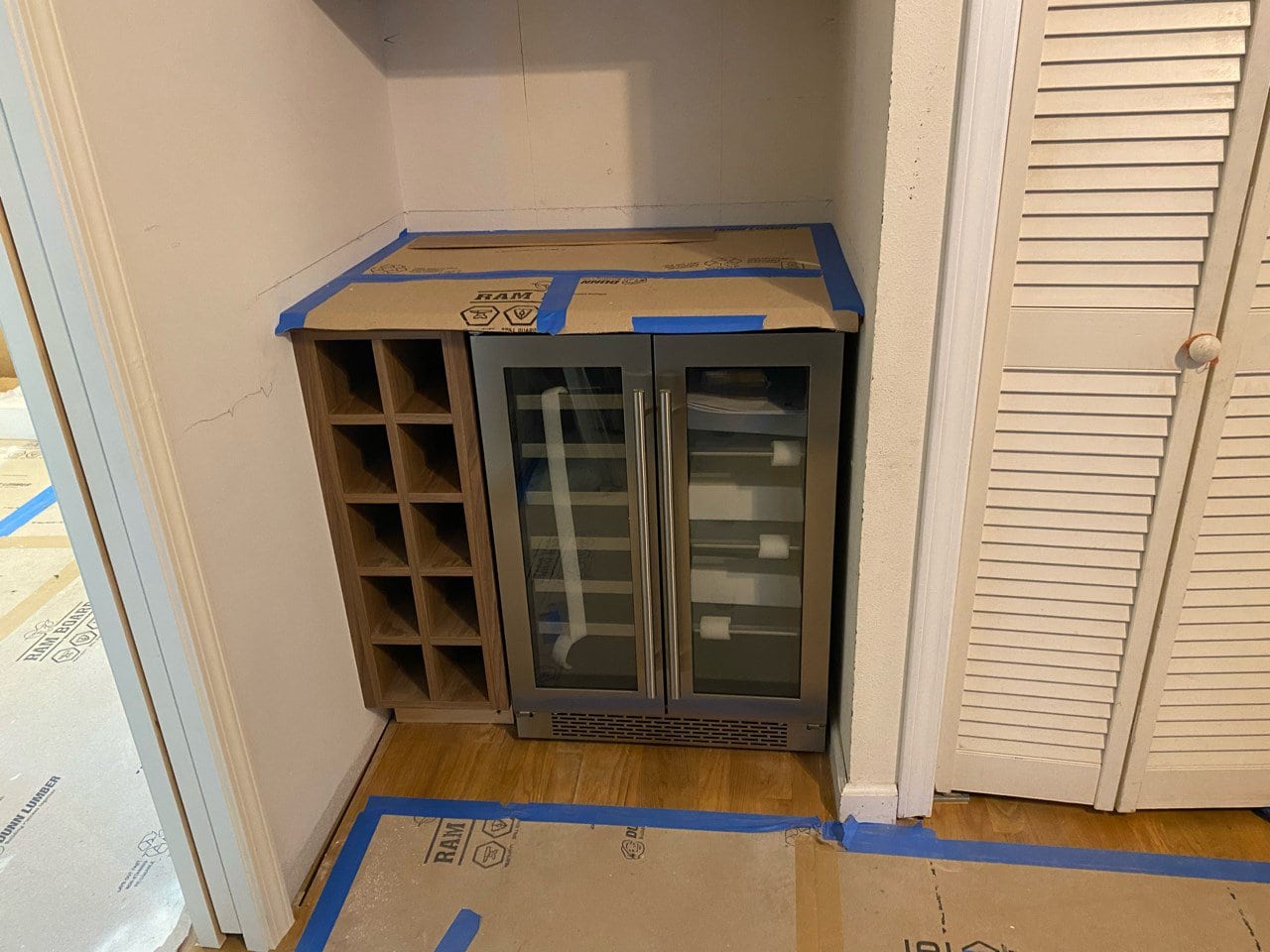 13th Ave Den wine cooler and cabinetry