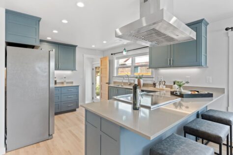 Kitchen 24th Ave Modern blue grey kitchen with grey peninsula bar 0045 194kb