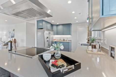Kitchen 24th Ave Modern blue grey kitchen with breakfast croissant on serving tray 0050 198kb