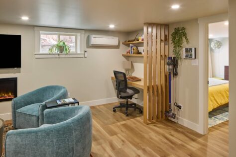 Basement living room with office nook