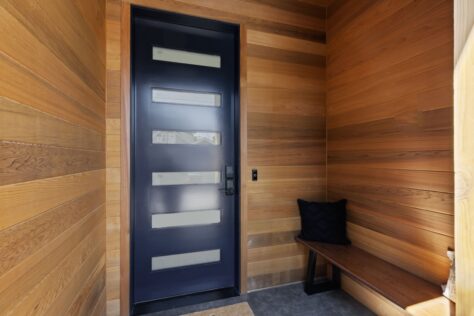 Interior Chapin Entry with horizontal wooden panels and 6 window door 0170 223kb