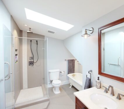 clean white bathroom with clawfoot tub