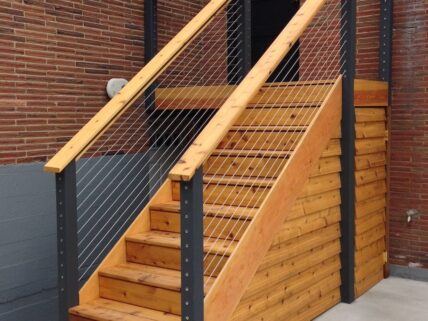 exterior wooden stairway with cable banisters