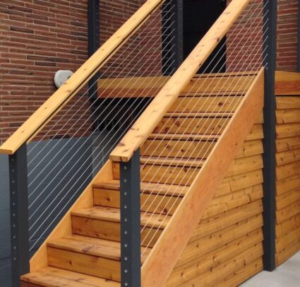 exterior wooden stairway with cable banisters