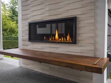 outdoor fireplace with wooden shelf