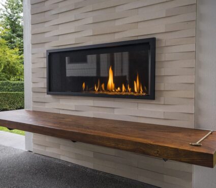 outdoor fireplace with wooden shelf