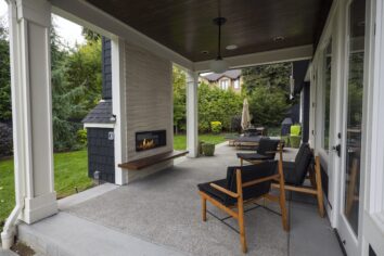 covered patio with fireplace