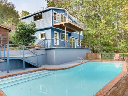 pool with deck house in background