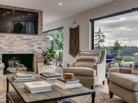 Open livingroom with brick fire place