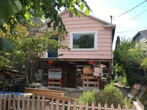 Pink house up on piers